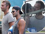 Ian Thorpe kisses new boyfriend Ryan Channing in passionate clinch as pair enjoy romantic pool date