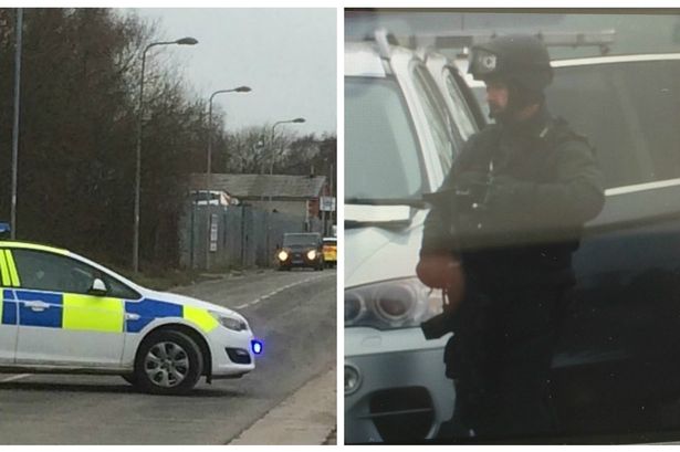 Sandycroft warehouse siege sees armed police surround units