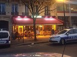 Gunmen open fire outside Paris restaurant, wounding at least one person 