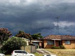 Heavy rain and storms mark the end of Sydney's three-week hot weather spell