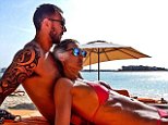 Laura Dundovic flaunts her rock hard tummy in a tiny bikini as she cuddles up to her boyfriend Quade Cooper in Dubai