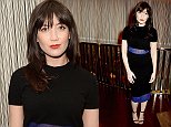 Daisy Lowe flashes her abs with lace panels as she cuts a sultry figure in a midnight palette for London fashion party