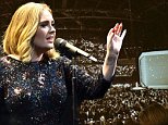 'You're on, you f***ers': Emotional Adele rails against terrorists on-stage as fans light up arena to support the victims of the Brussels bombings