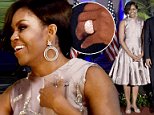 Buenos Aires bling! Michelle Obama trades her engagement ring for some VERY glitzy jewels to match an equally glamorous dress as she dances the night away in Argentina