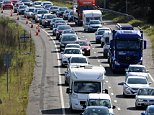 Gridlock on the motorways? It must be the great Easter getaway: Tailbacks on the A1 signal the start of the bank holiday weekend as 17 million drivers are due to hit the roads and t worse is to come with transport strike 
