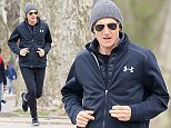 Liam Neeson looks the picture of health as he jogs around Central Park