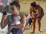 Baby's first beach break! Doting mum Coleen Rooney shows off her incredible post baby-body as she takes newborn son Kit for day on the shores during blissful Barbados getaway