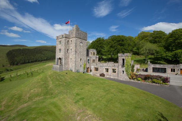 Gyrn Castle up for sale for £3.9m complete with its own fire-breathing dragon