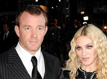 Madonna and guy ritchie urged by judge to resolve dispute over son rocco