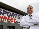 Sports direct shares tumble as mike ashley admits group is 'in trouble'