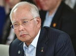 Under fire Malaysian prime minister hits back at claims he took more than £1BILLION from state owned investment firm he founded himself