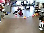 Shocking moment gunman wounded two cops after luring them to Walmart in an ambush before being shot dead