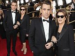 Dapper Colin Farrell arrives arm in arm with his glamorous mother Rita at the Golden Globes
