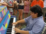 Piano prodigy, 11, wows crowds with an impromptu performance in Perth