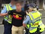 Sydney Man charged over flag burning at Invasion Day march