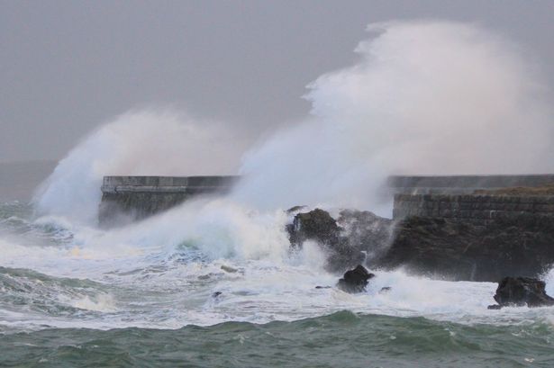 Dramatic photos show waves battering the North Wales coast
