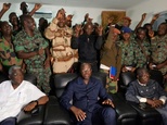Mutinous Ivory Coast troops holding defence minister despite deal: AFP