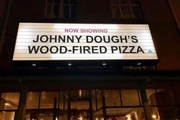 Llandudno's Johnny Dough's forced to remove sign by conservation chiefs as not 'Victorian enough'