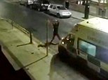 Thug hurled a concrete slab through an ambulance window