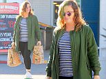 Amy Poehler cuts a casual figure for shopping trip