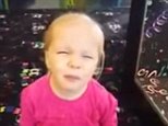 Young girl tries a VERY sour piece of candy