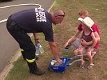 Brave boy wheels drinks to firefighters in Willmot