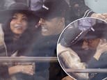 Chanel Iman and Sterling Shepard kiss at ice hockey game