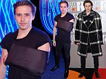 Brooklyn Beckham shows off arm sling at BRITs after party