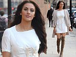 Jessica Cunningham wears knee-high boots on London outing