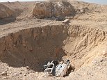 ISIS jihadis turned sinkhole into mass grave