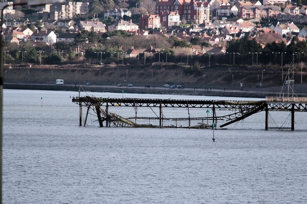 Clear up of Colwyn Bay pier begins amid fears that strong winds could cause even more damage