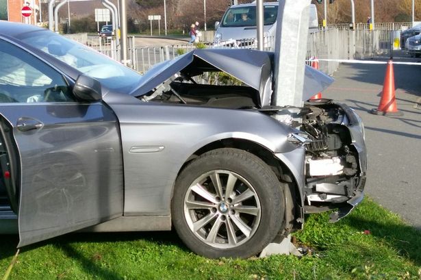 Car's front end split in two by lamp post in Llandudno crash