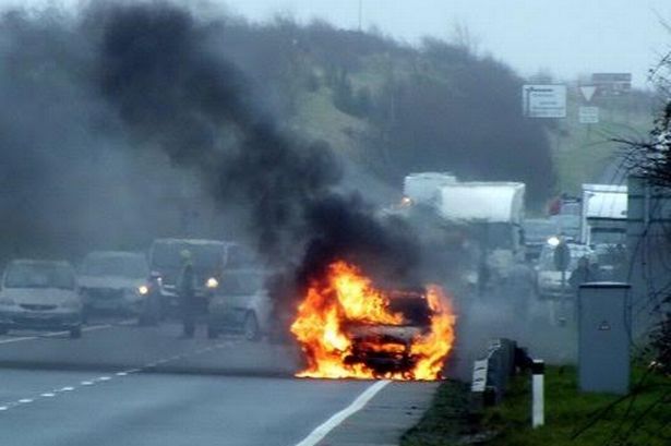 Dramatic images show burning car on A55
