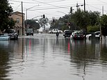 5 rescued from swollen creek as storms pummel California