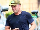 Karl Stefanovic goes for a run in colourful shorts