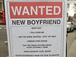 Lonely heart posts hilarious signs in her quest for love