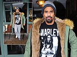 David Haye hobbles out of The Ivy on crutches