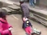 Grandpa drags his grandson out of classroom and beats him