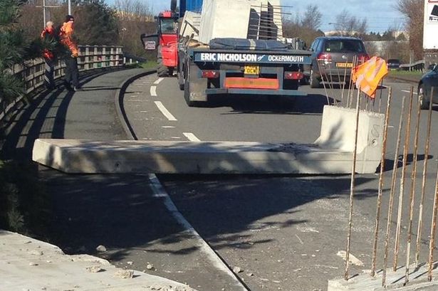 Lorry sheds 1.5 tonnes of concrete onto busy road in Deeside