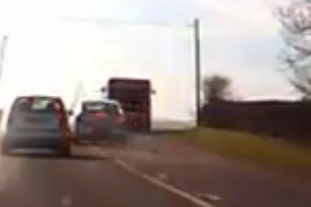 Watch nail-biting moment car on A5151 Denbighshire narrowly misses hitting bus head-on