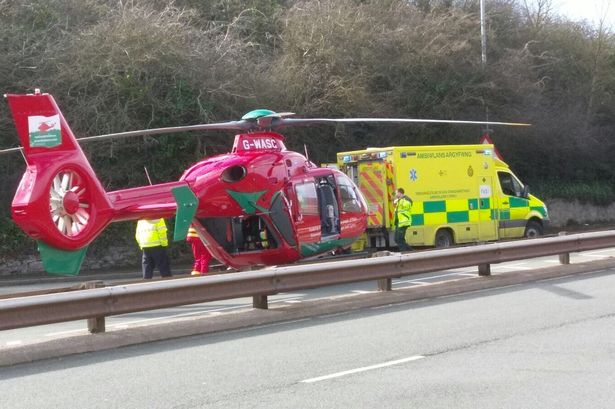 Woman cut free from Old Colwyn crash and flown to hospital with serious injuries