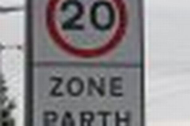 Wrexham parents and pupils protect 20mph sign after council blunder