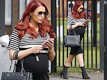Amy Childs shows off eye-popping baby bump in tight dress