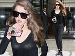 Gigi Hadid wears see-through top for gym run in NYC