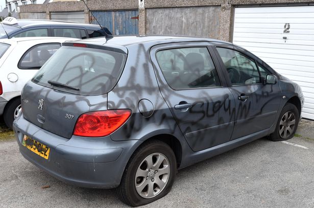 Two arrests after Caernarfon wrecking spree sees 14 cars daubed with paint and tyres slashed
