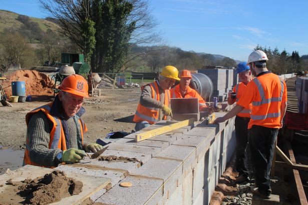Llangollen Railway volunteers are helping to build a new station in Corwen