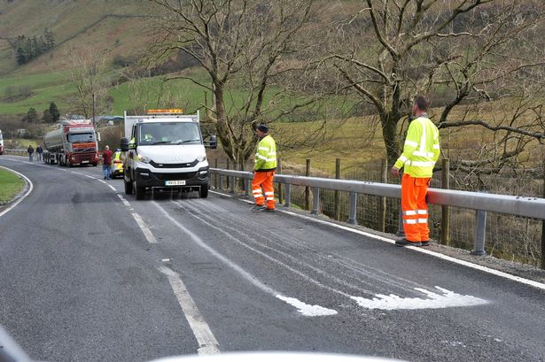 Milk lorry sheds its load shutting A470 for three hours