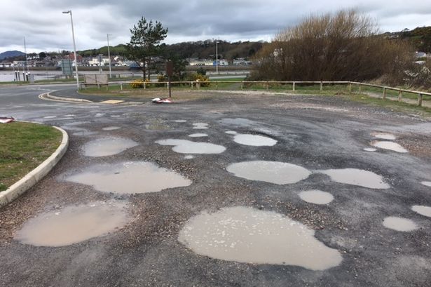 Watch what this crater-riddled Pwllheli car park does to your vehicle