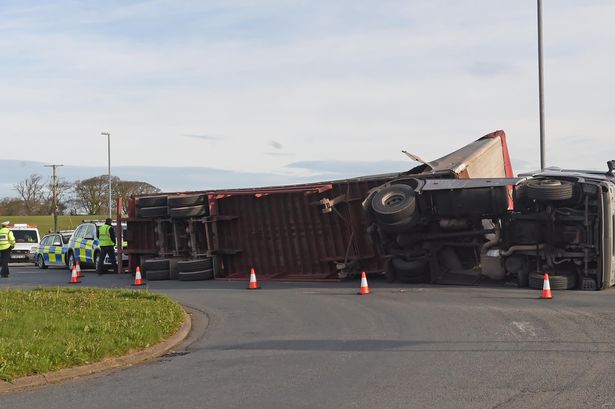 Sawdust lorry overturned on busy Gwynedd roundabout