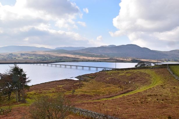 Eight mile walk around Gwynedd man-made lake surrounded by history ancient and modern